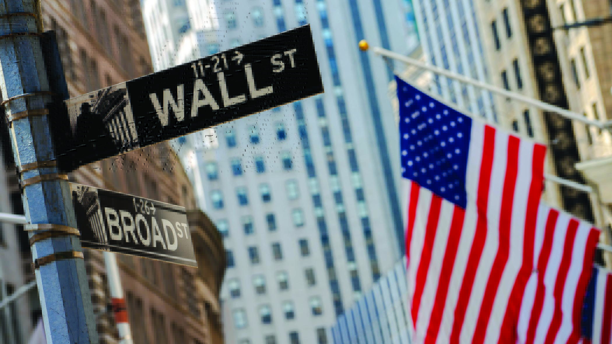 flag-and-wall-street-sign